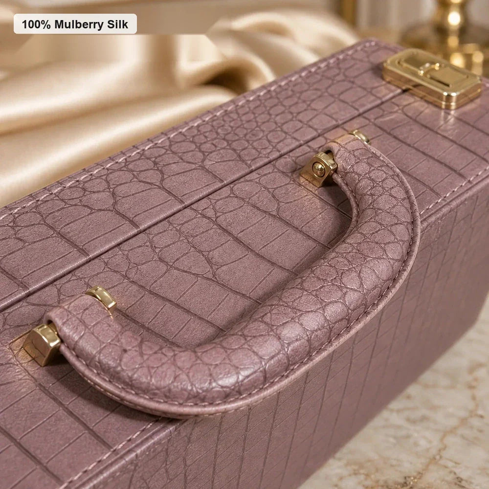 Close-up of textured gift box handle and gold-tone hardware for Silkgala luxury silk bedding