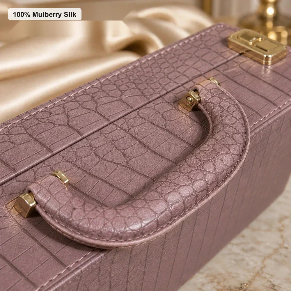 Close-up of textured gift box handle and gold-tone hardware for Silkgala luxury silk bedding