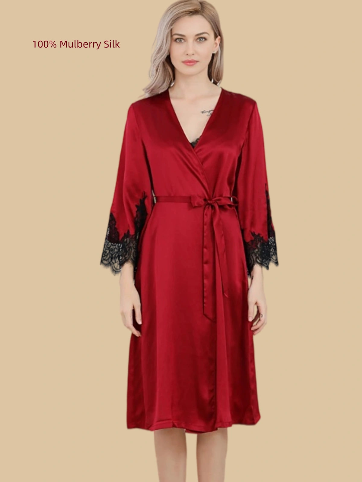 Front view of a Deep Red 16 Momme mulberry silk wrap robe with black lace cuffs and a waist tie