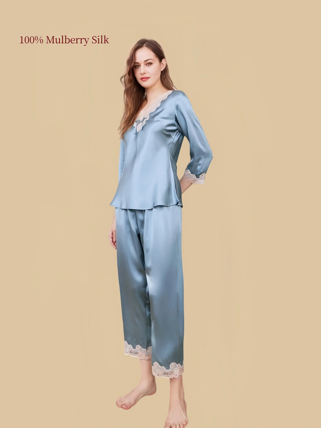 Silkgala 16 Momme Hazy Blue mulberry silk pajama set with floral lace V-neckline, matching bow and straight-leg pants with lace hems.