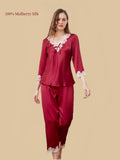 Silkgala 16 Momme Jujube Red mulberry silk pajama set featuring a floral lace V-neck, decorative bow and matching straight-leg pants with lace hems.