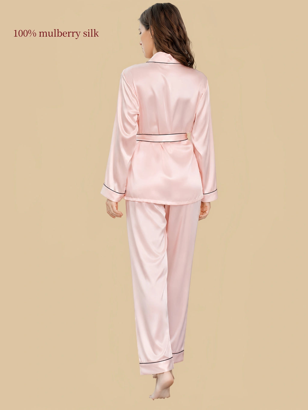 Back view of Silkgala 16 Momme pink silk pajama set showing the waist tie, relaxed long-sleeve top and matching straight-leg pants.