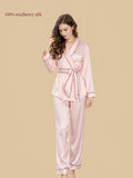 Silkgala 16 Momme pink mulberry silk pajama set with wrap-front top, waist tie, contrast piping and matching long pants.