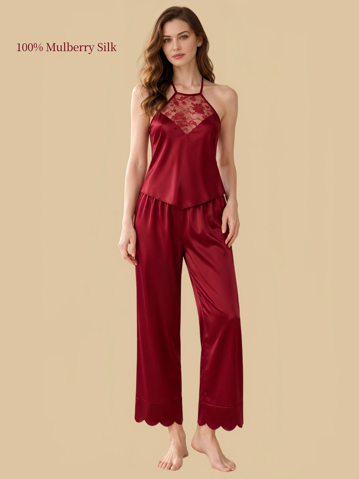 Luxurious Red silk halter top with a decorative floral lace front panel and relaxed pants with scalloped cuffs.