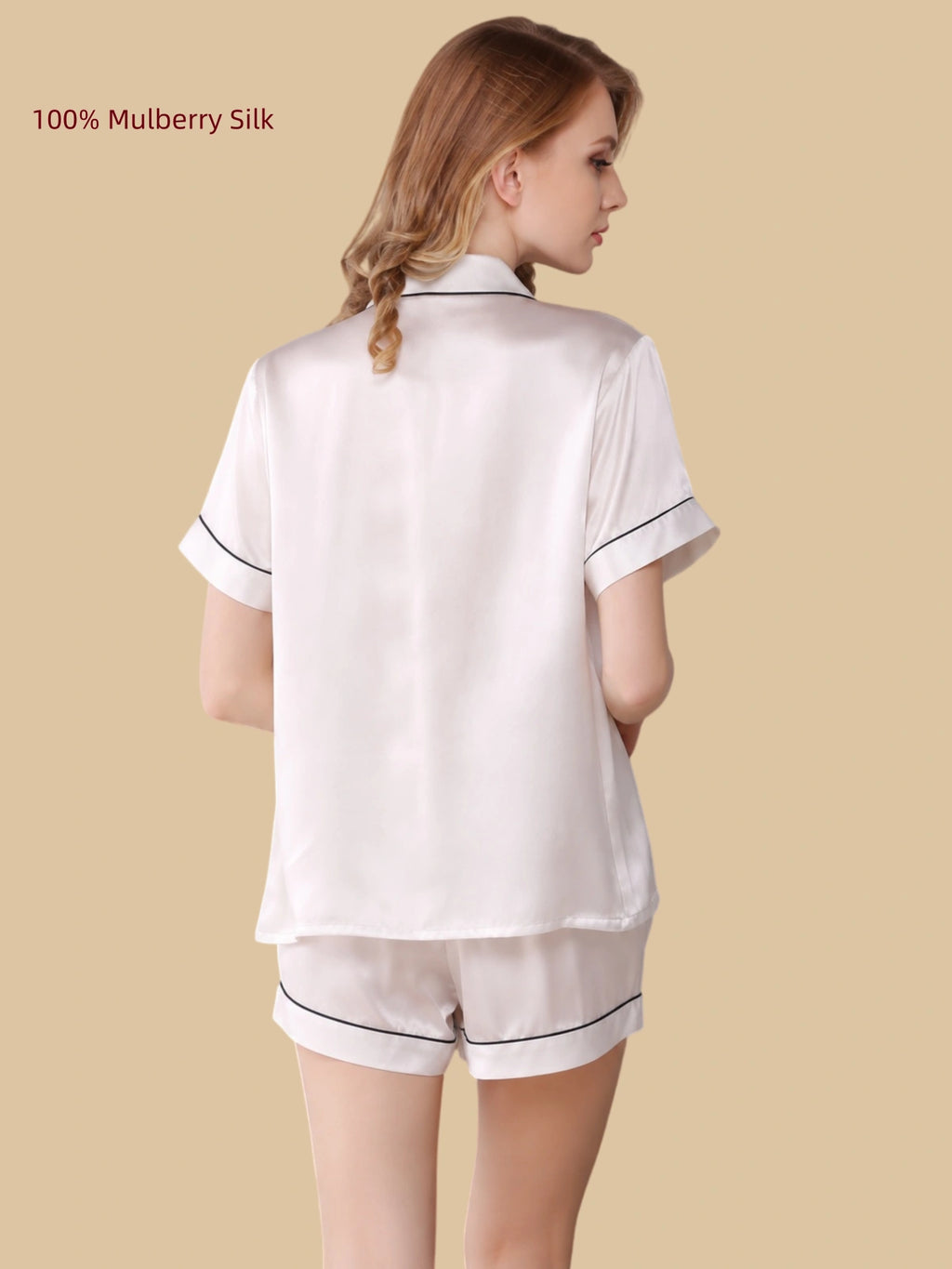 Back view of a white 16 Momme mulberry silk short pajama set with contrast piping