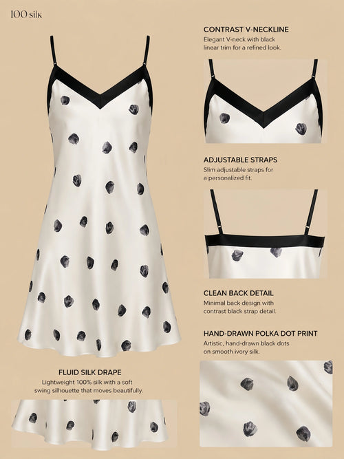 16mm silk slip dress with hand-drawn polka dots, black V-neck trim, adjustable straps, and fluid drape