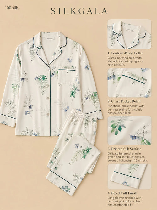 Silkgala 16mm printed silk pajama set in white with botanical print, contrast-piped collar, chest pocket, and full-length pants.