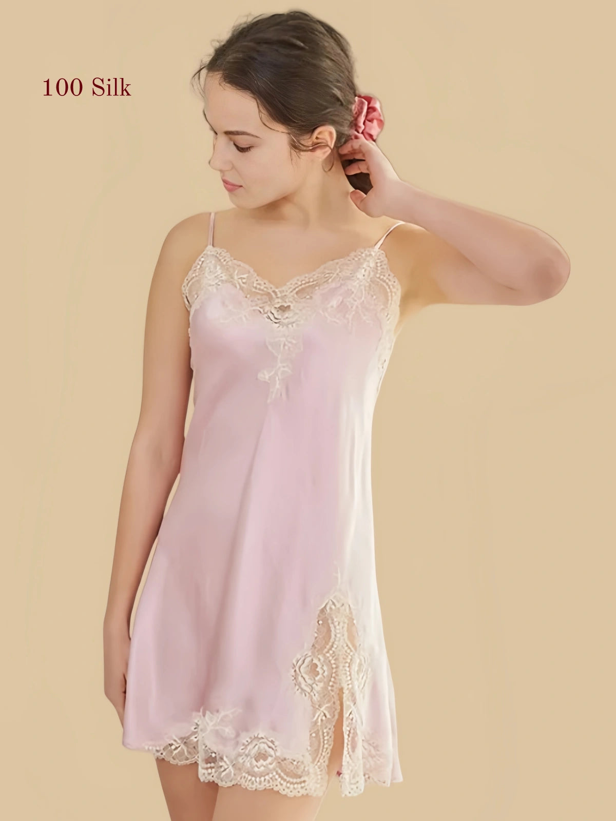 Front view of a Blush Pink 19 Momme mulberry silk chemise with floral lace trim