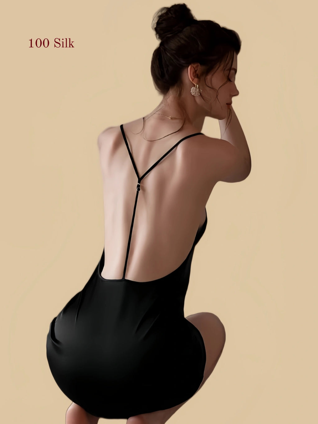 Black silk nightgown seated back view