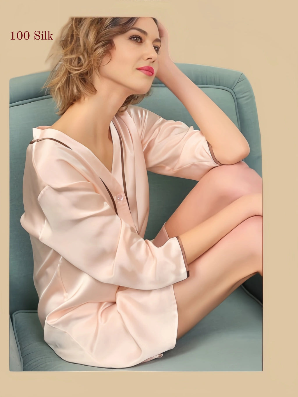 Woman relaxing in a blush pink 19 Momme silk sleep shirt with three-quarter sleeves