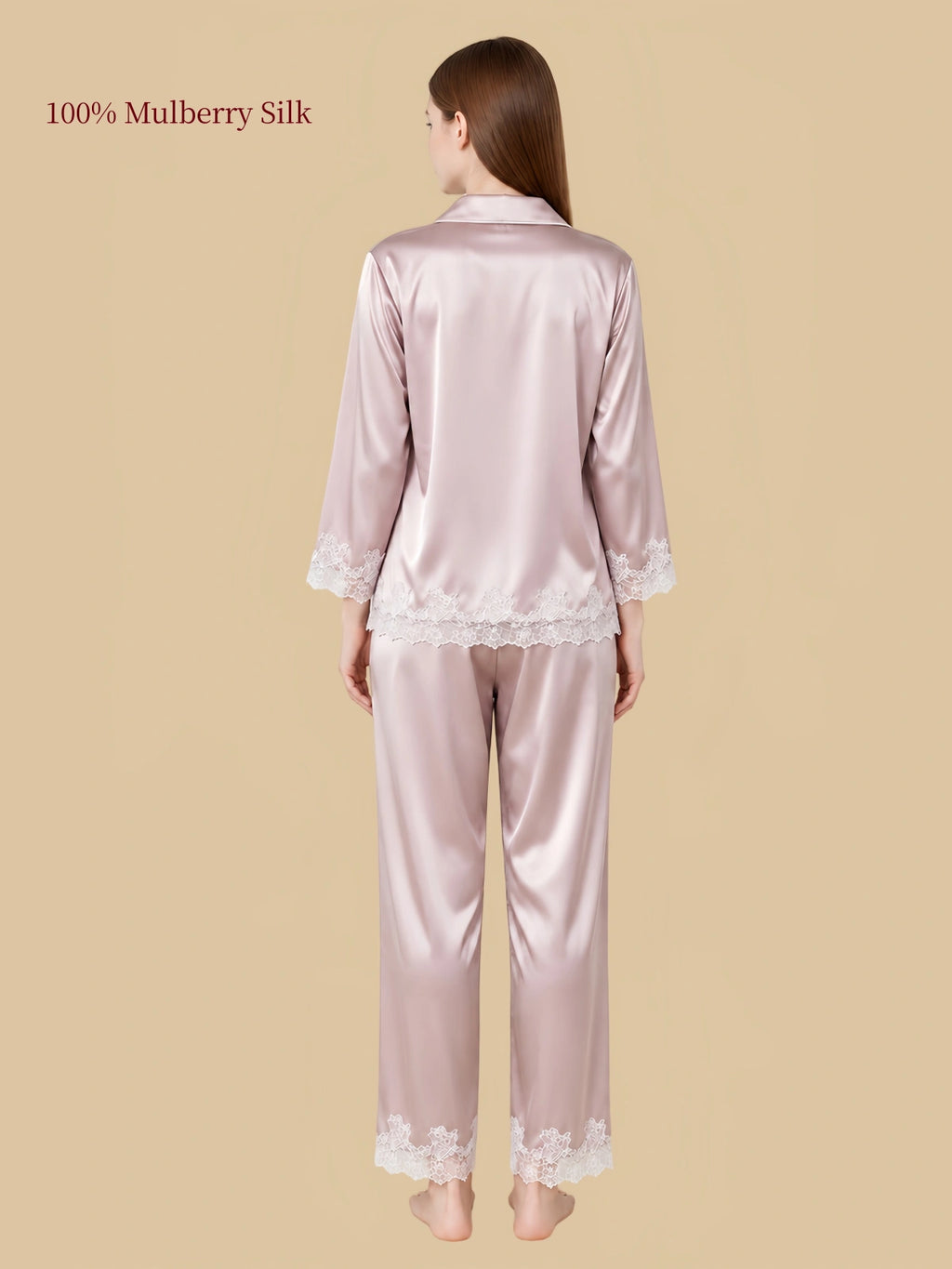 Back view of Silkgala Cherry Blossom Pink mulberry silk pajamas showing floral lace along the shirt hem, sleeve cuffs and pant hems.