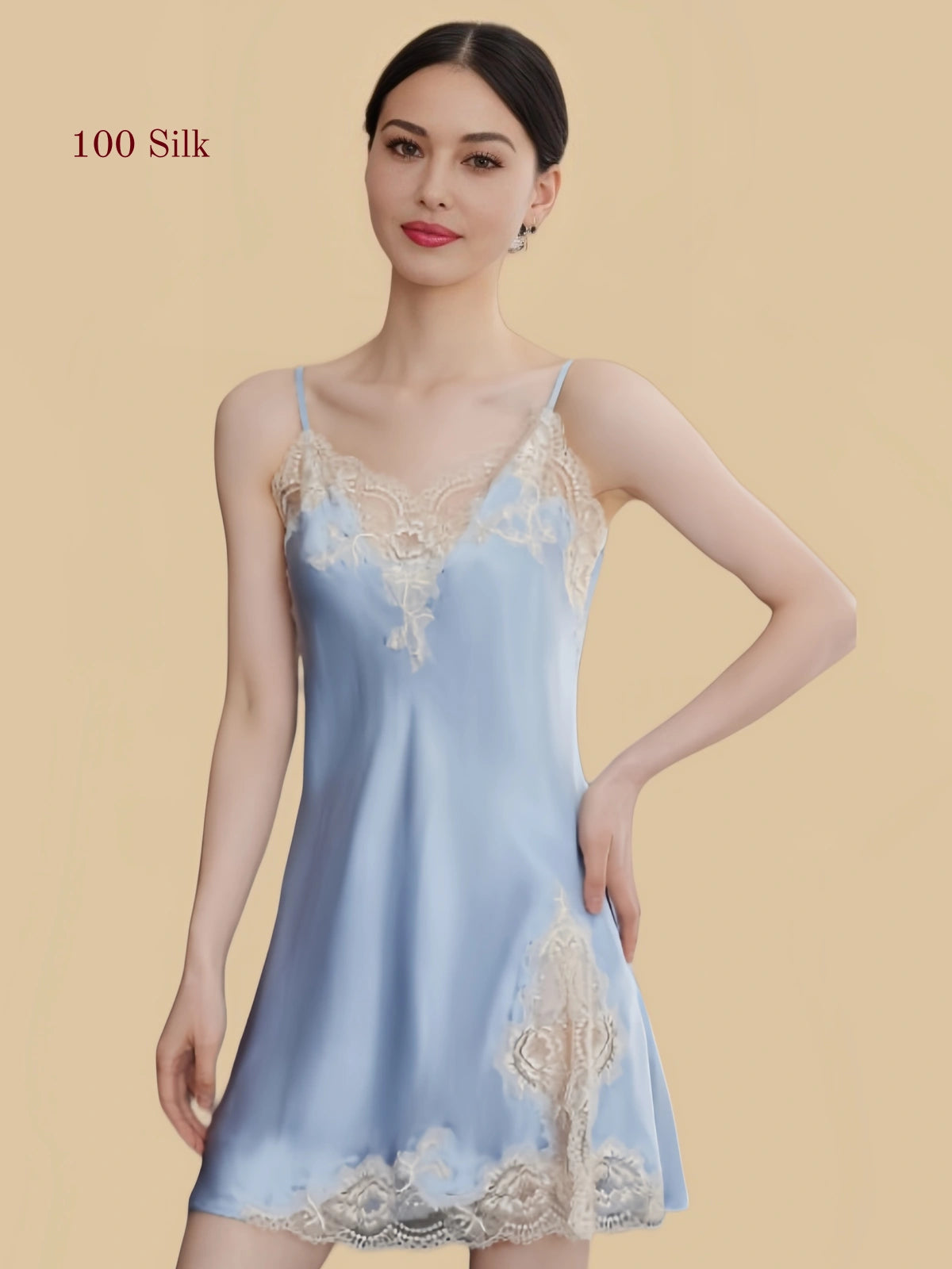 Front view of a light blue 19 Momme mulberry silk chemise with floral lace trim