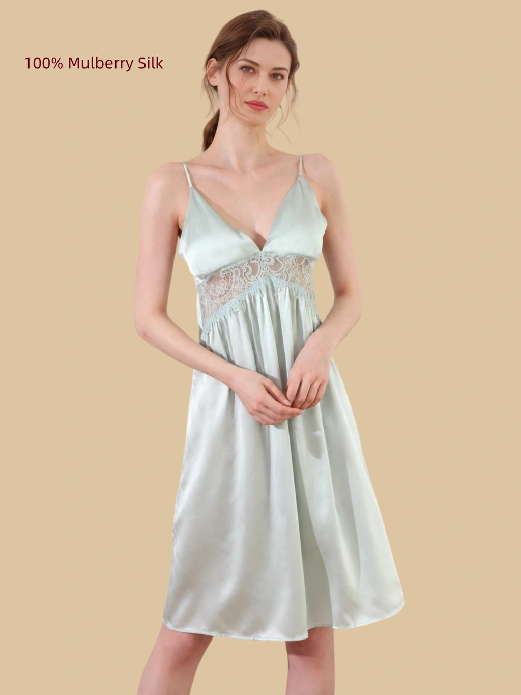 Front view of a Mint Green 19 Momme mulberry silk chemise with adjustable straps and lace empire waist