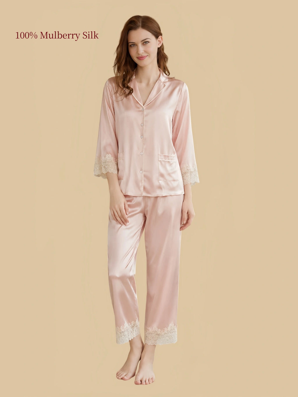 Silkgala Pink 19 Momme mulberry silk two-piece pajamas with a notched collar, three-quarter sleeves, two front patch pockets and floral lace-trimmed pants.