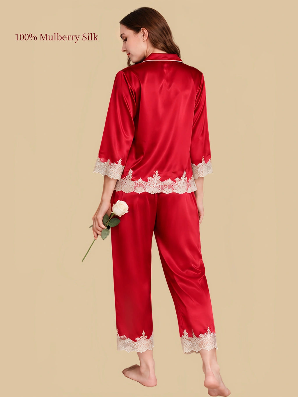 Back view of Rouge Red silk pajamas showing the smooth silk fabric and ivory lace borders on the shirt and cropped pants.