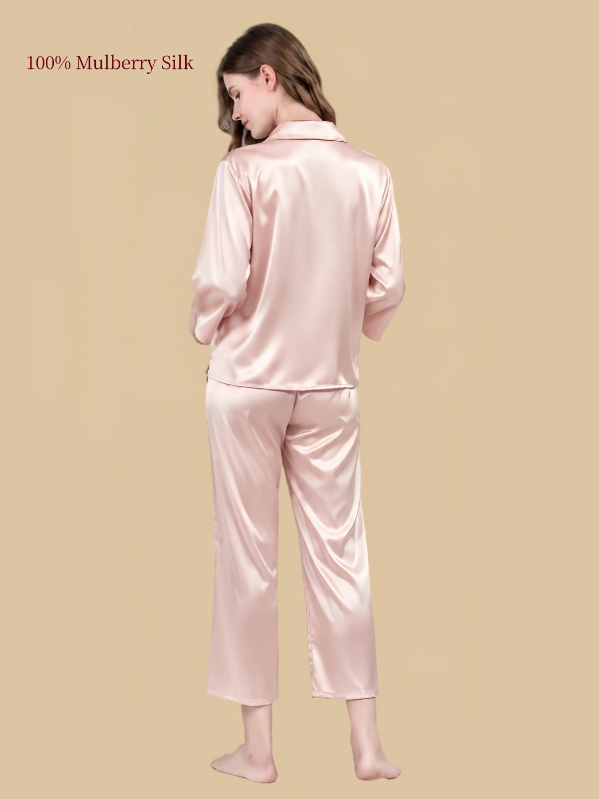 Back view of Pale Crimson silk pajama set showing the softly draped top and matching straight-leg pants