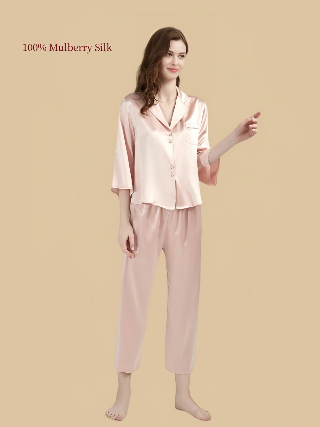 Pale Crimson 19 momme mulberry silk pajamas featuring a button-front top, three-quarter sleeves and relaxed cropped pants.