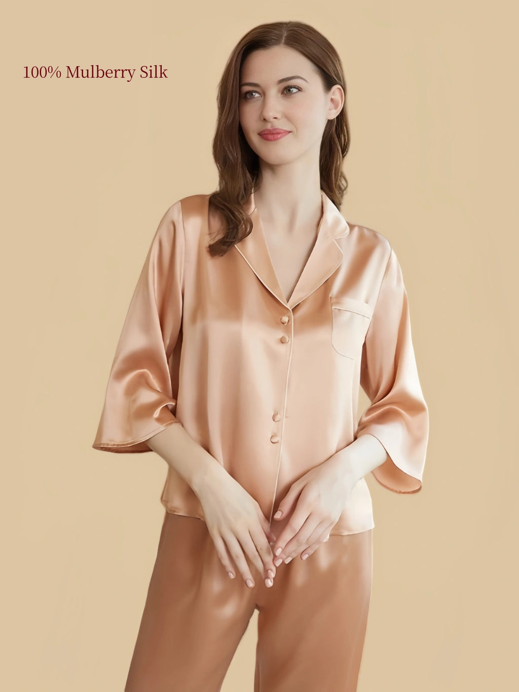 Close-up of Wheat Gold mulberry silk pajama shirt with notched lapels, fabric-covered buttons and chest pocket.