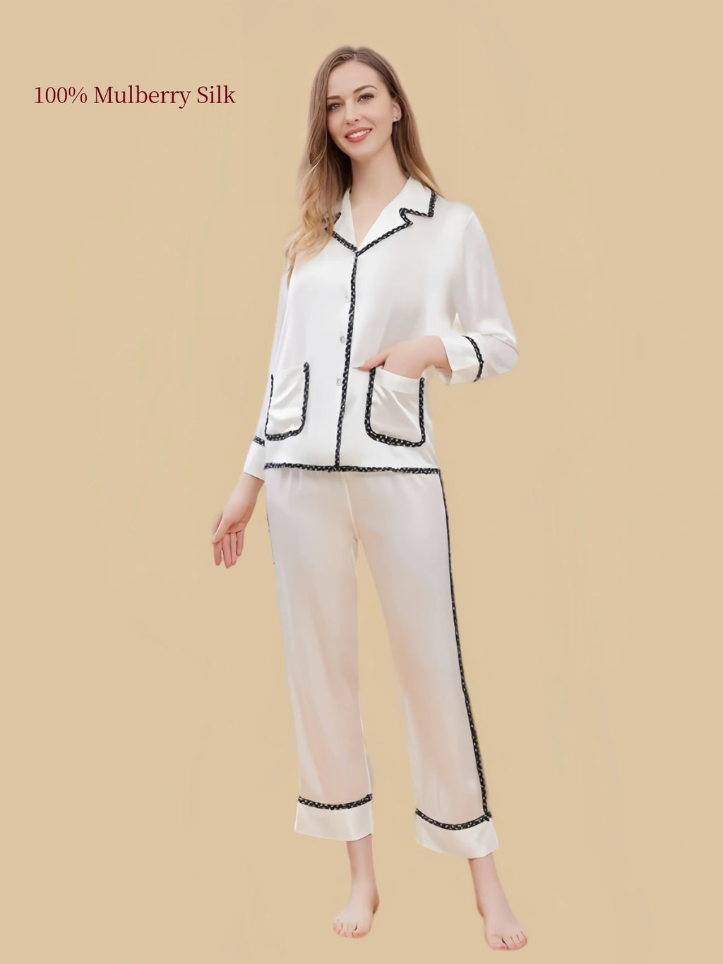 White mulberry silk pajama set with black contrast braided trim, two front patch pockets and a notched collar.