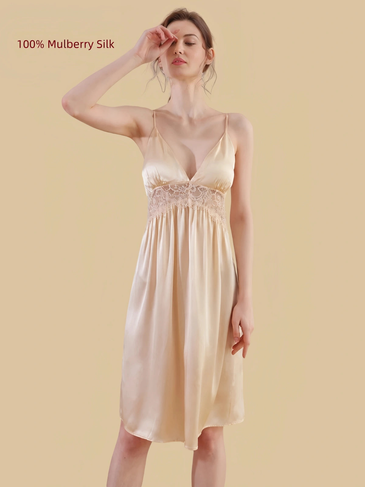 Front view of a Wheat Gold 19 Momme mulberry silk chemise with adjustable straps and empire-waist lace