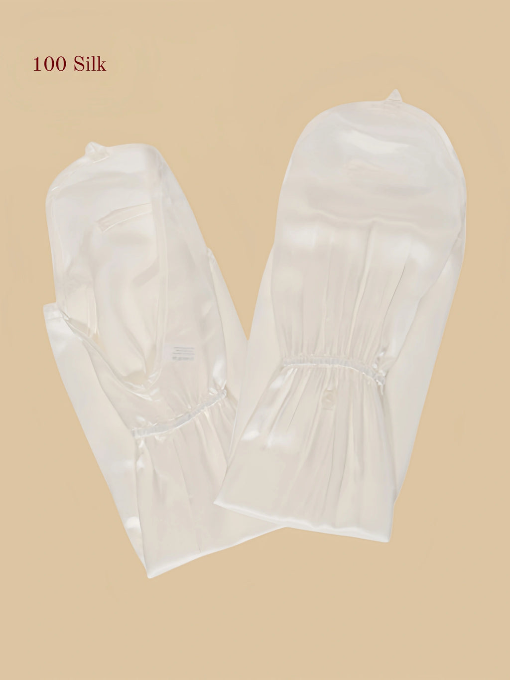 white 19MM mulberry silk arm sleeves showing long coverage and soft glossy silk finish.