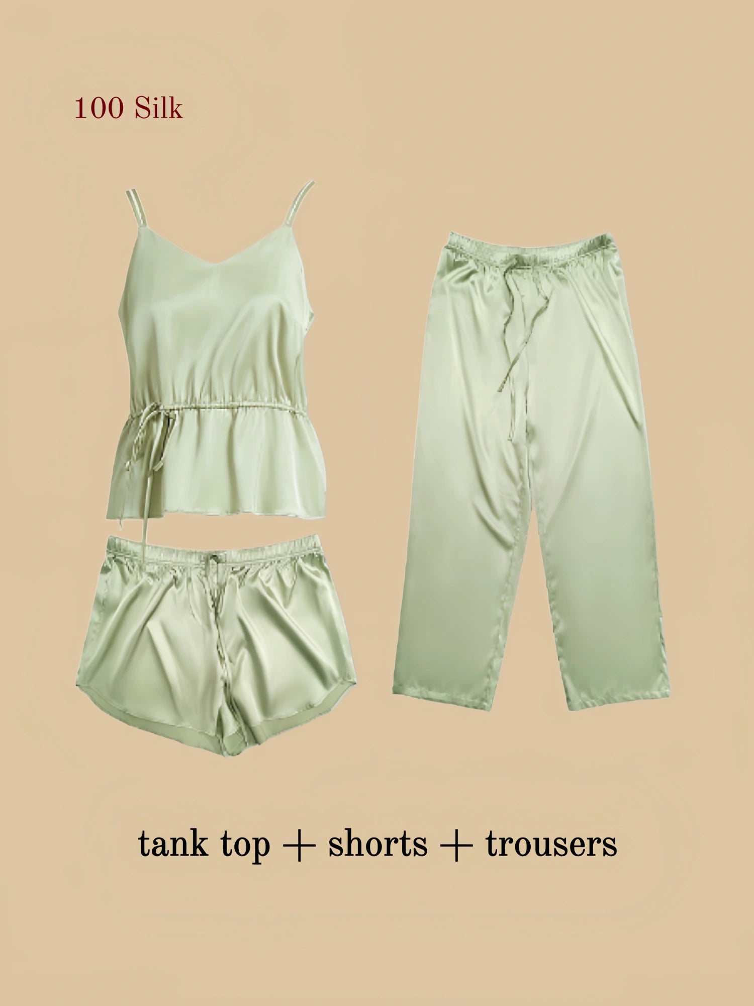Flat lay of sage green silk three-piece set showing cami top, curved shorts, and wide-leg trousers.