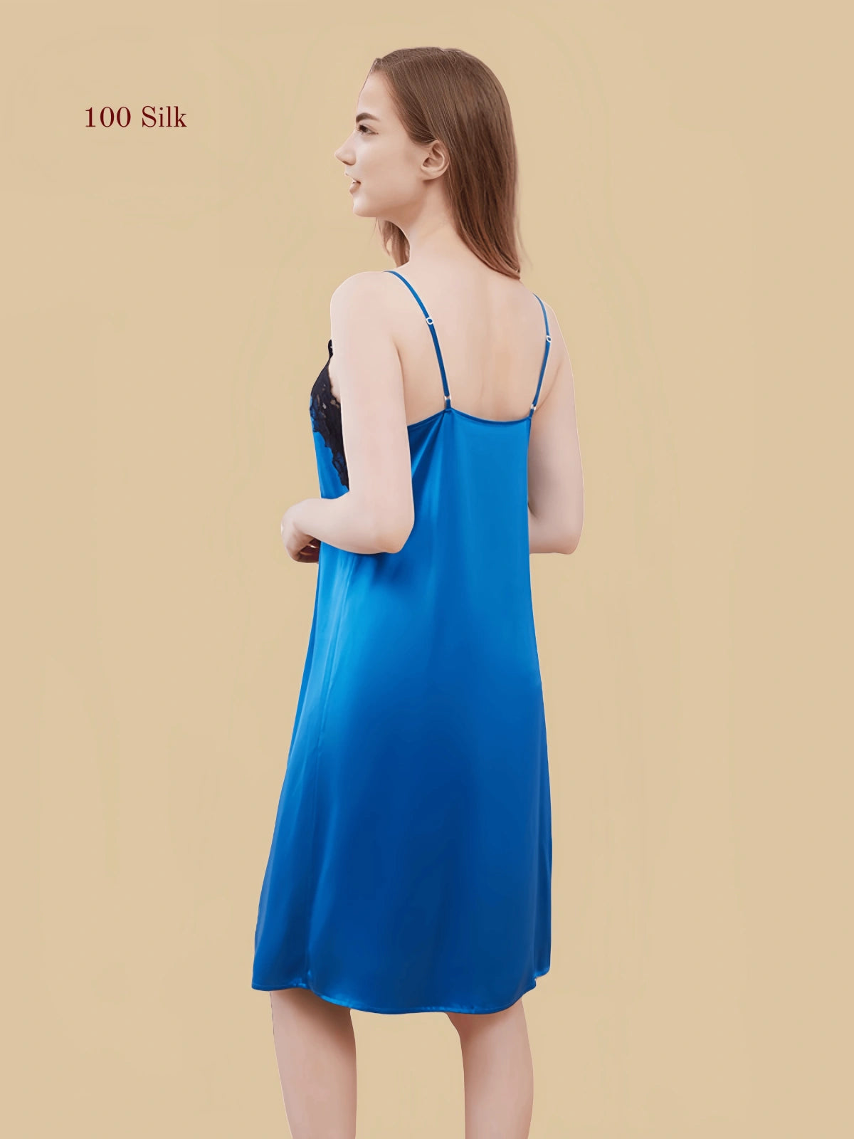 Blue 19mm silk slip back view with adjustable straps and smooth back line