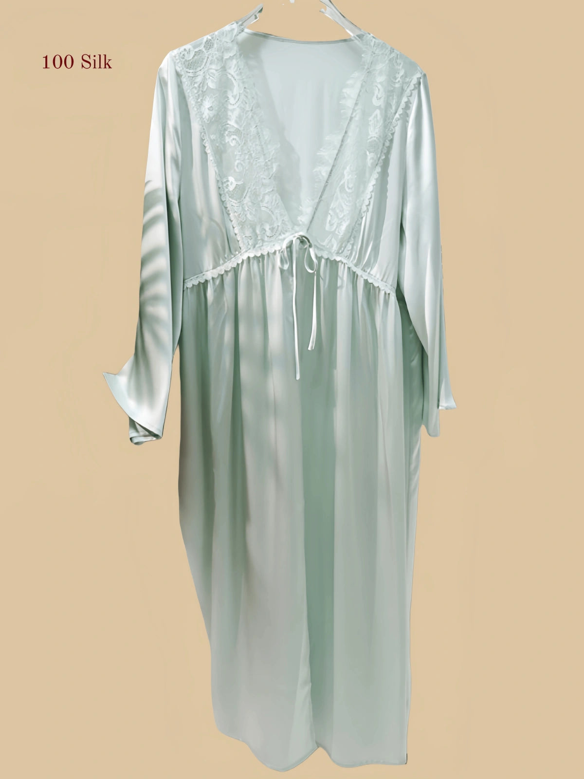 Green 19mm silk two-layer set front view with scalloped black lace V bodice and long outer gown