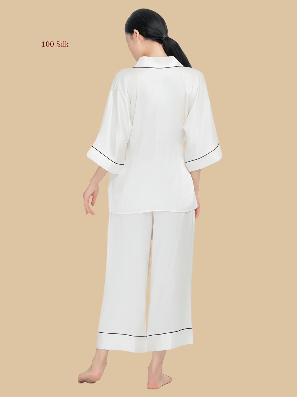 Silkgala Rear view of the silk 3/4 sleeve lounge set showing the smooth, seamless 19mm silk drape.
