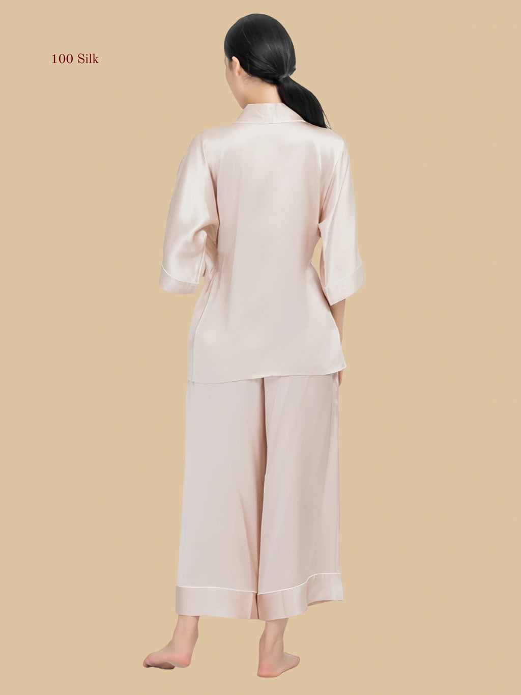 Rear view of the silk 3/4 sleeve lounge set showing the smooth, seamless 19mm silk drape