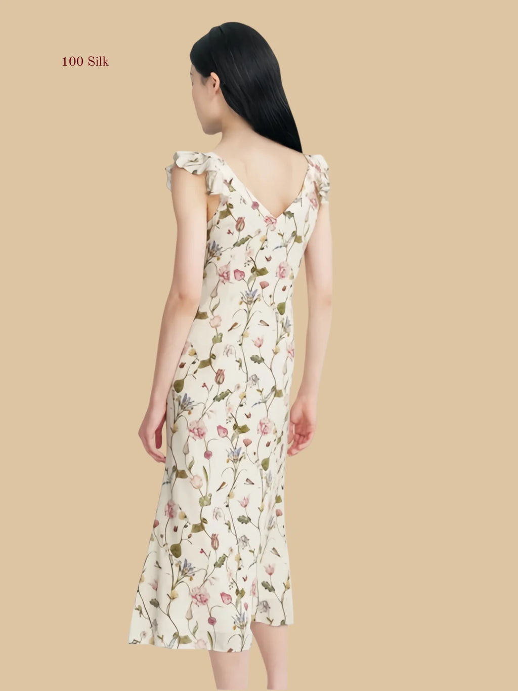White floral 19mm silk maxi dress back view with long printed skirt and soft V back