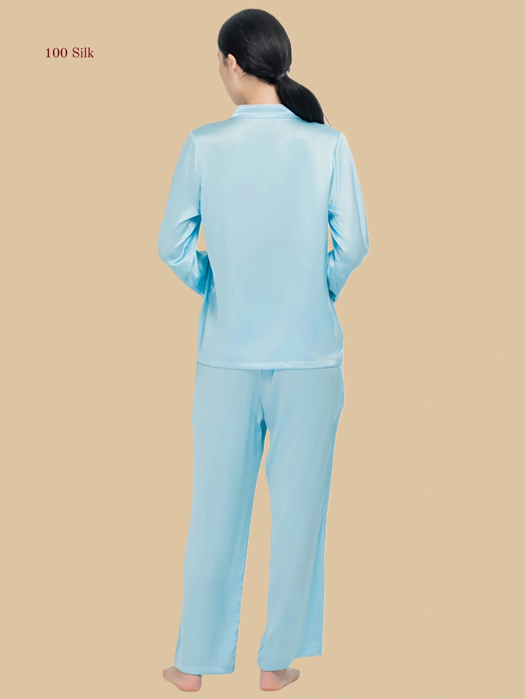 Navy blue 19mm soft V pajama set back view with relaxed long-sleeve top and straight pants