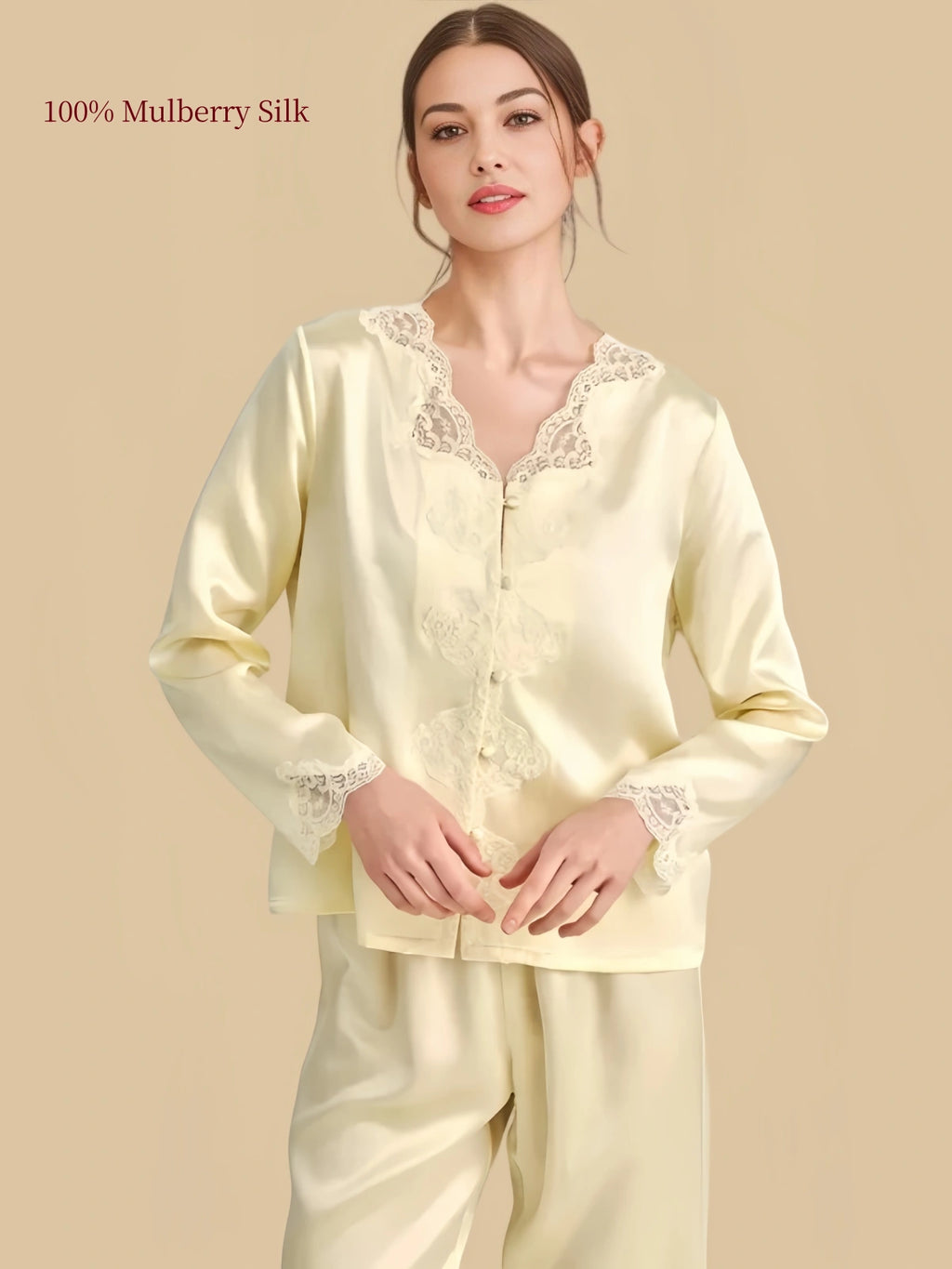 Close front view of Coconut Milk silk pajamas featuring tonal floral lace, button-front top and decorative sleeve cuffs.