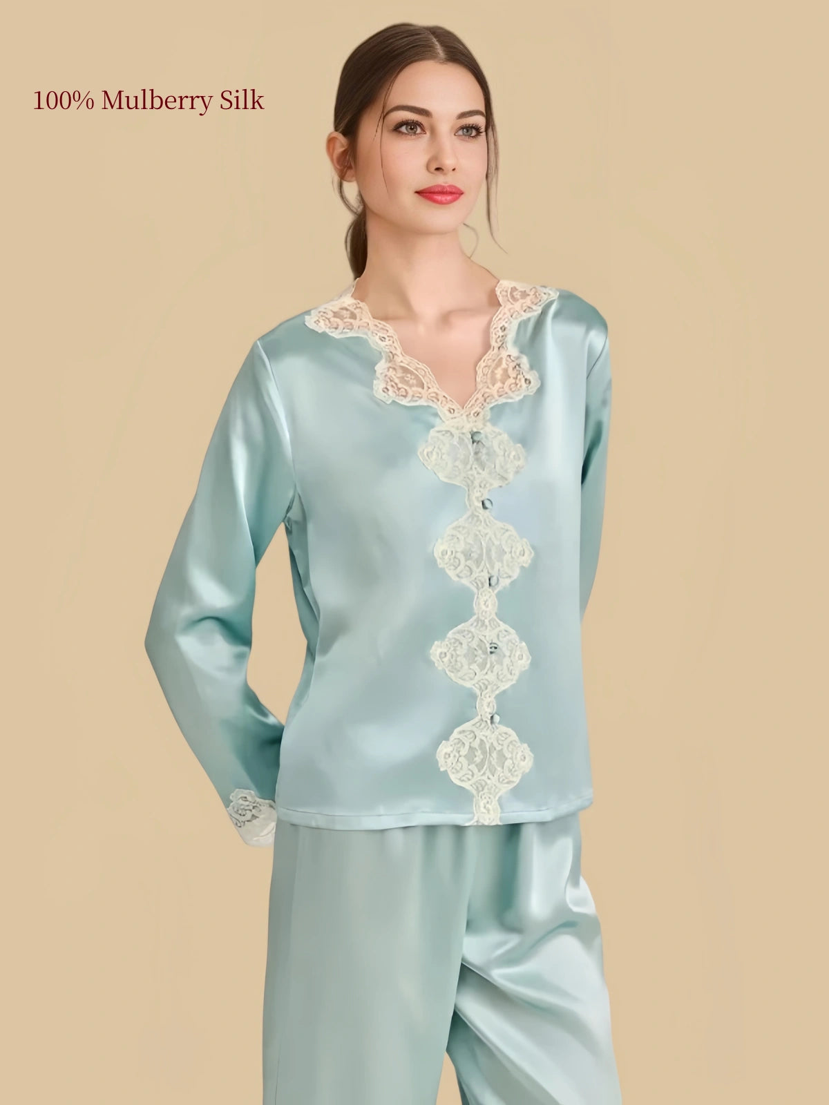 Closer front view of Hazy Blue silk pajamas showing floral lace around the neckline, covered buttons and lace-trimmed sleeve cuffs.