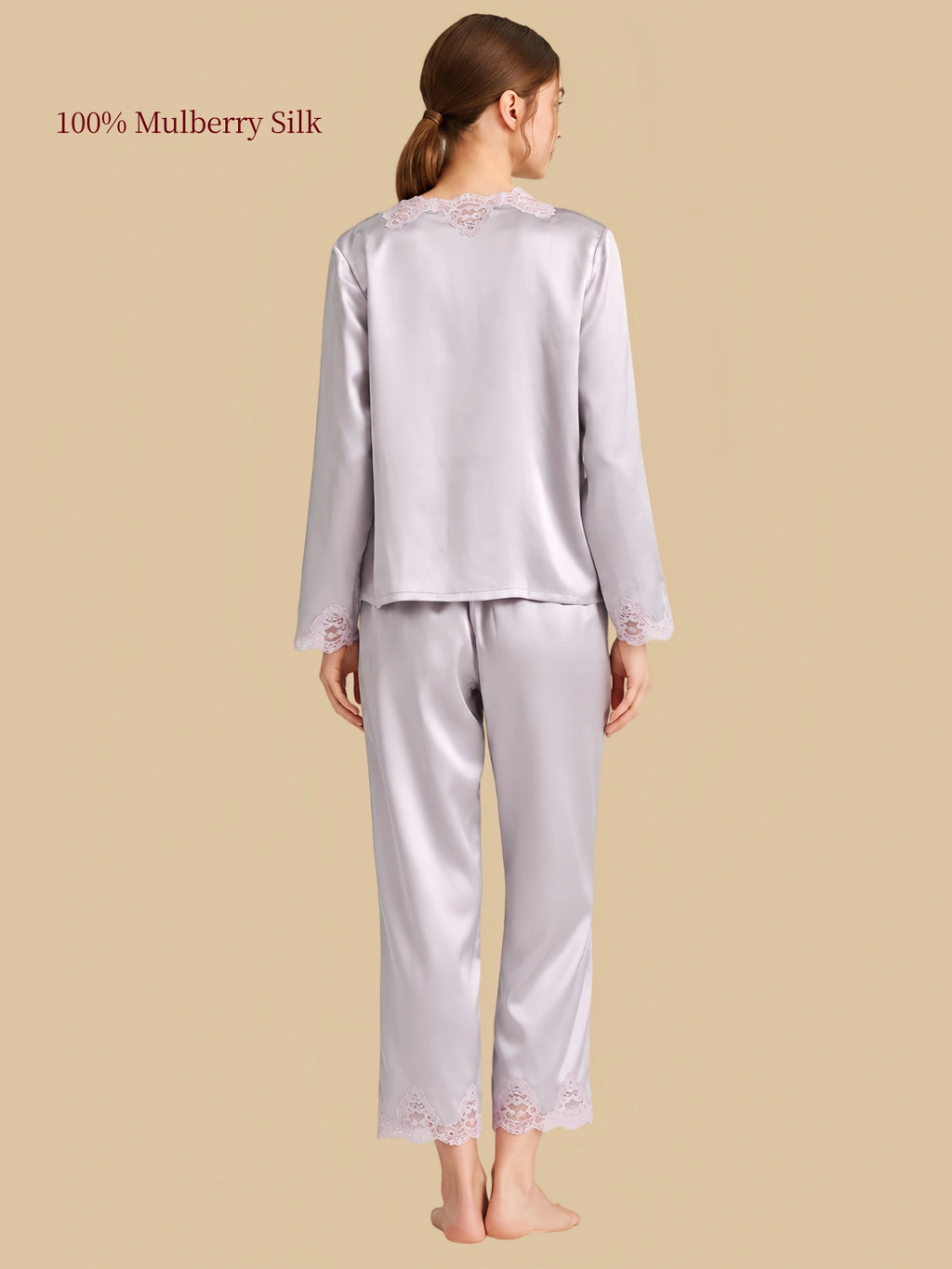 Rear view of Misty Purple silk pajamas showing lace accents at the neckline, sleeve cuffs and lower pant hems.