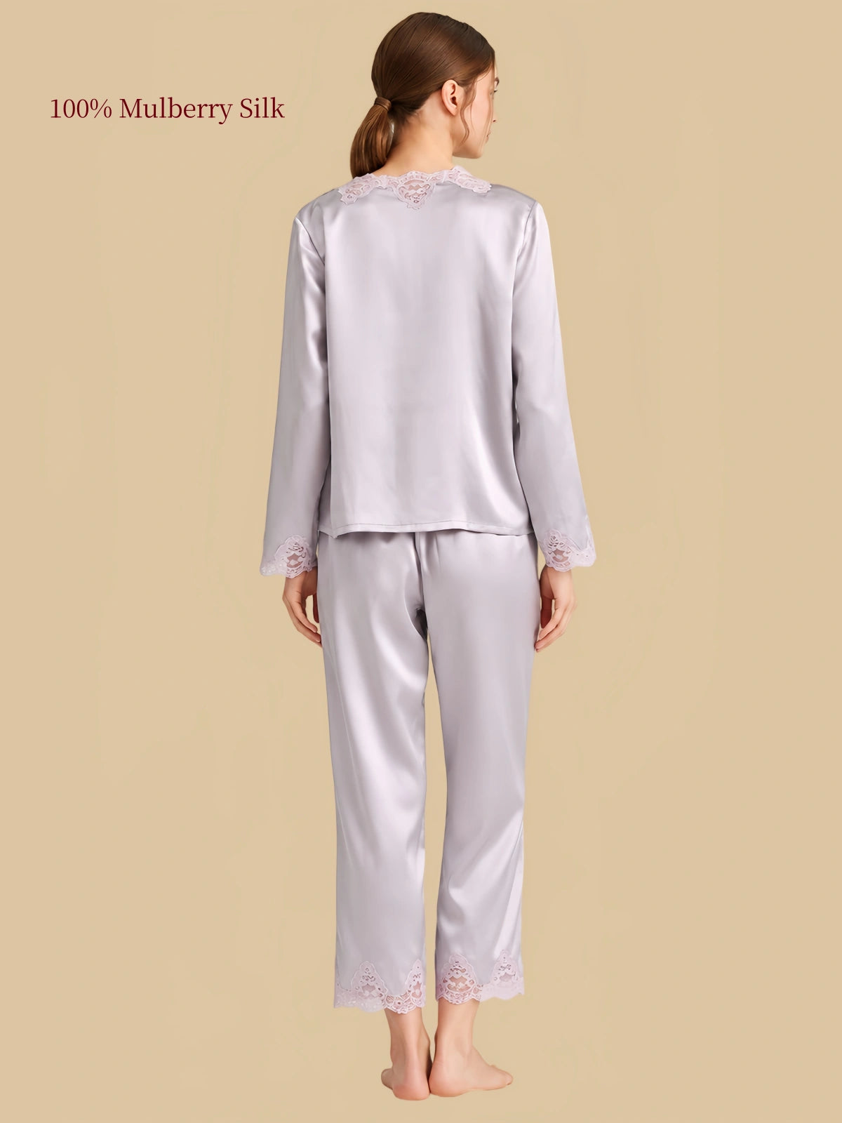 Rear view of Misty Purple silk pajamas showing lace accents at the neckline, sleeve cuffs and lower pant hems.