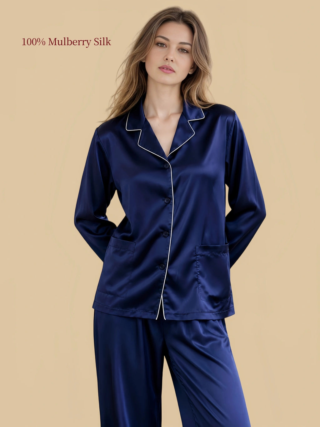 Close view of Deep Navy silk pajama top showing white contrast piping, classic notched lapels, matching buttons and double patch pockets