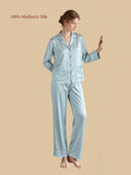 Stone Blue 22 momme mulberry silk pajama set with classic notched lapel collar, front patch pockets and full-length pants