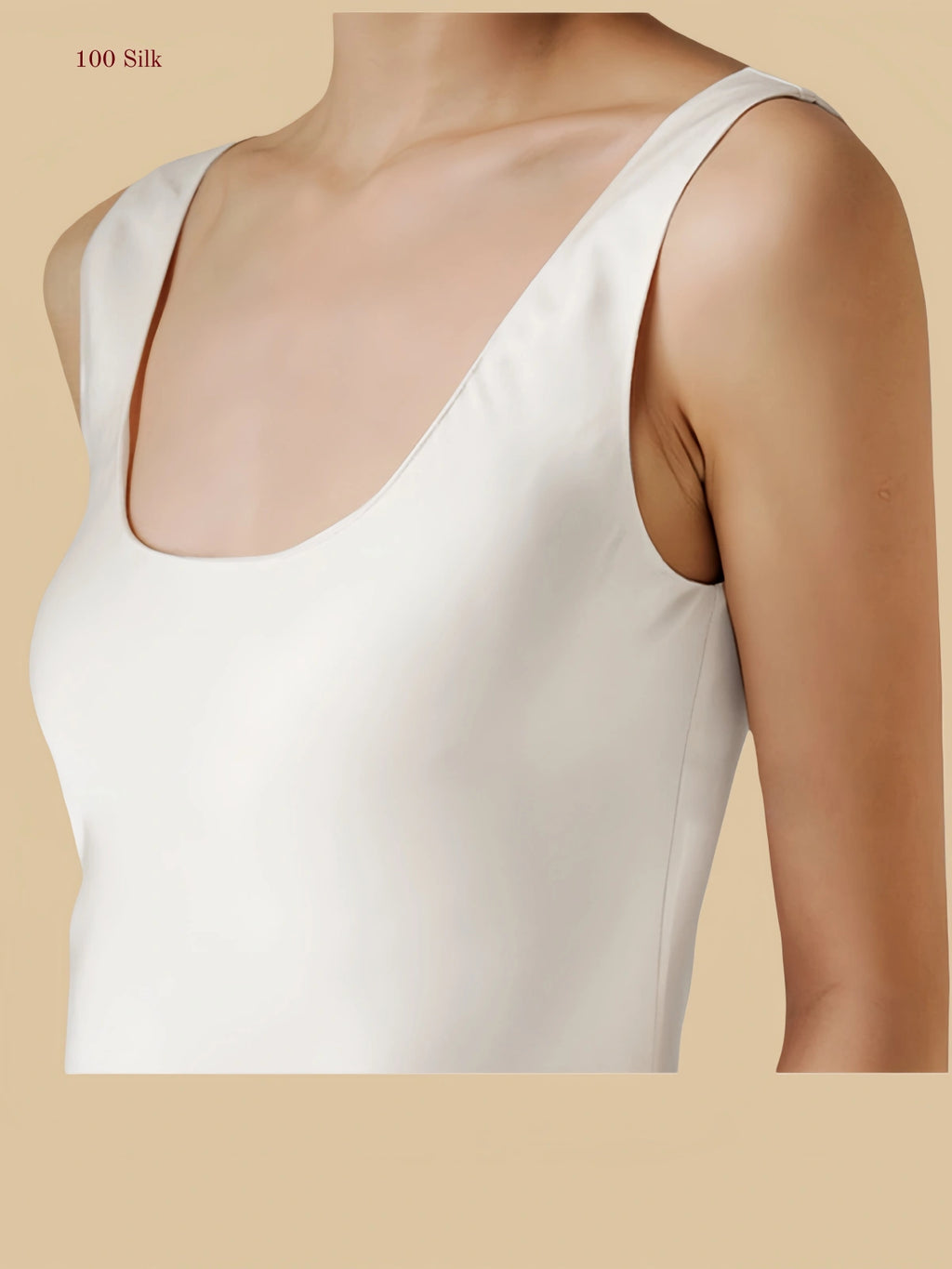 white 22mm scoop-neck silk maxi dress close-up showing wide shoulder straps and smooth neckline