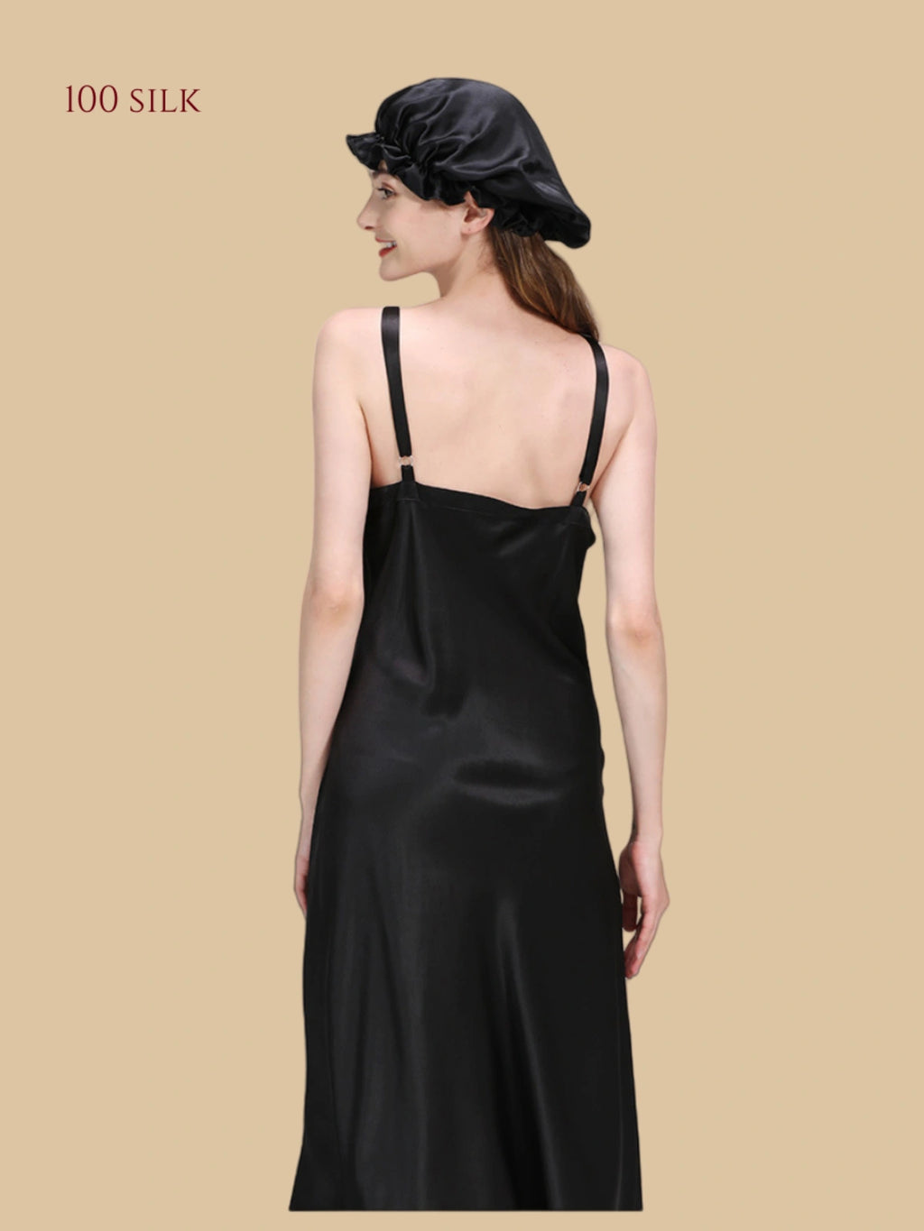 Rear view of the 22 momme luxury long nightgown showing the adjustable straps and over-the-knee length.Black.