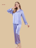 Purple 22 momme long-sleeve pajamas front view with fine contrast piping and chest pocket