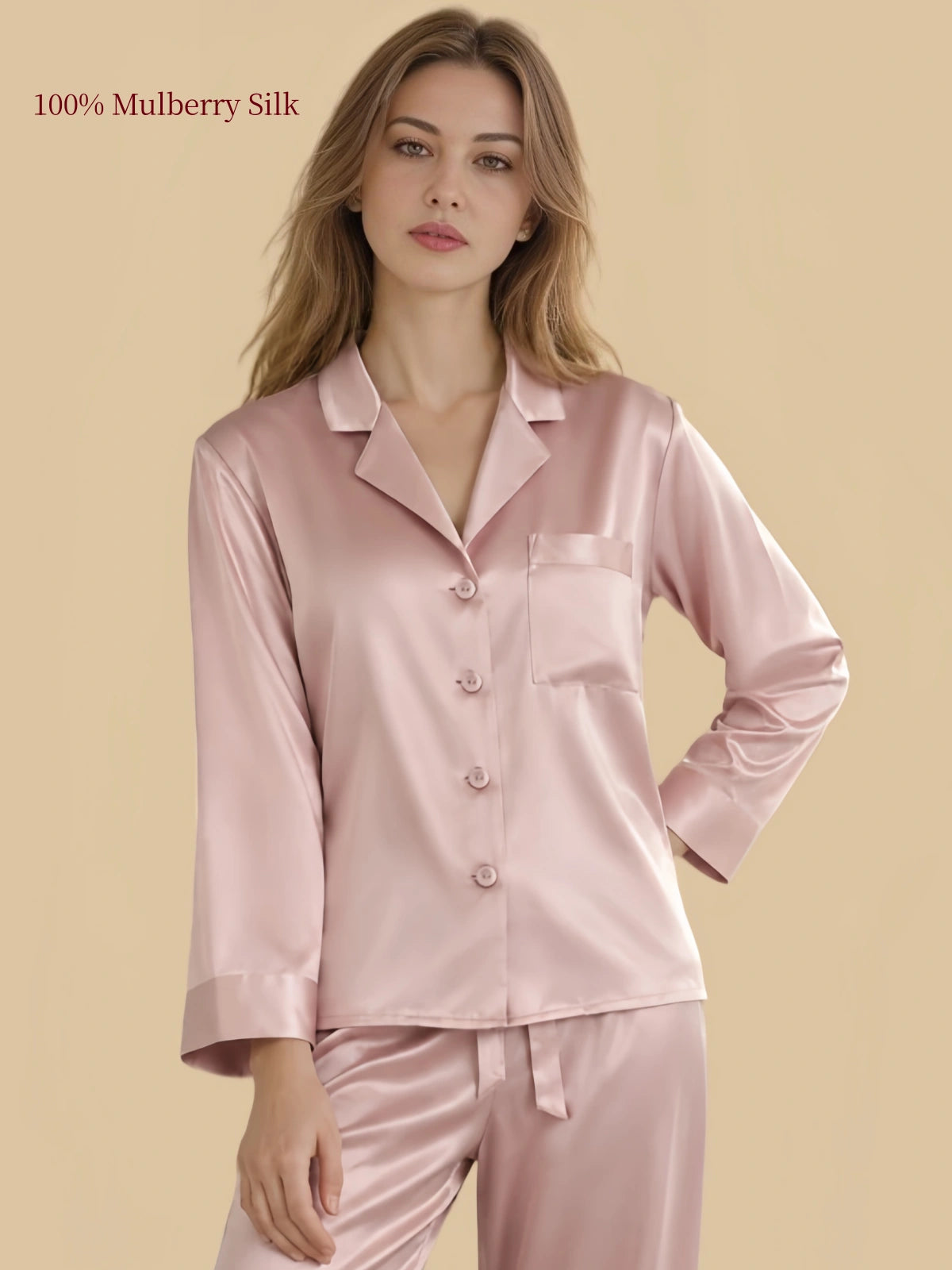 Close-up of Dusty Pink silk pajama shirt with notched lapel collar, matching silk-covered buttons and single chest pocket