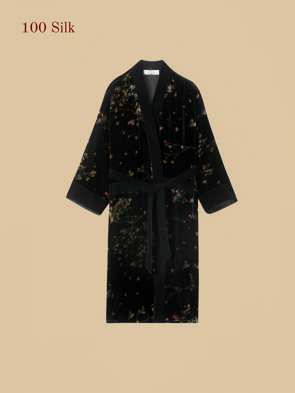 Black silk velvet robe set with open-front floral velvet robe, self-tie belt, patch pockets, long sleeves, and matching open-back slip dress on a beige product detail background.