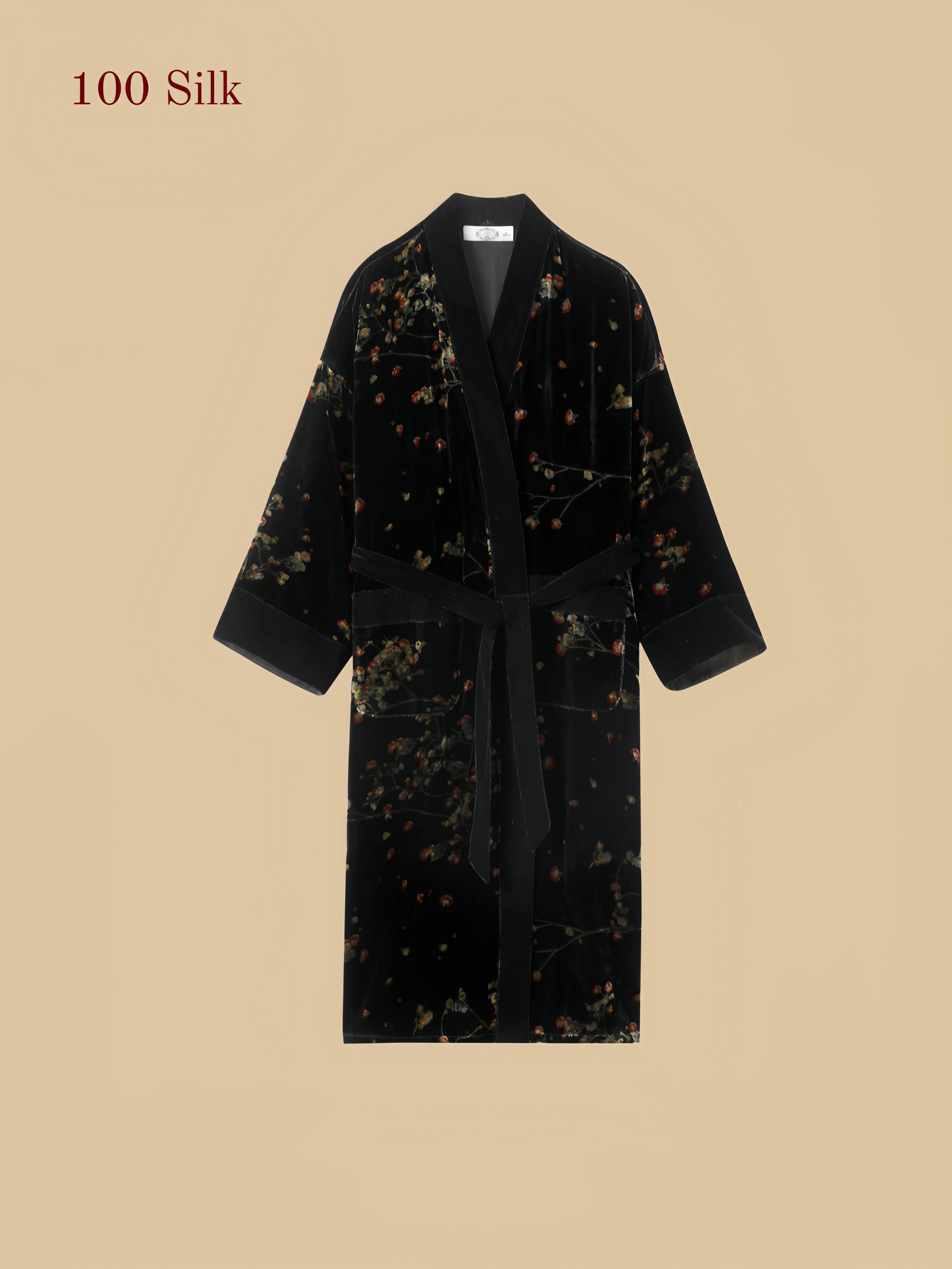 Black silk velvet robe set with open-front floral velvet robe, self-tie belt, patch pockets, long sleeves, and matching open-back slip dress on a beige product detail background.