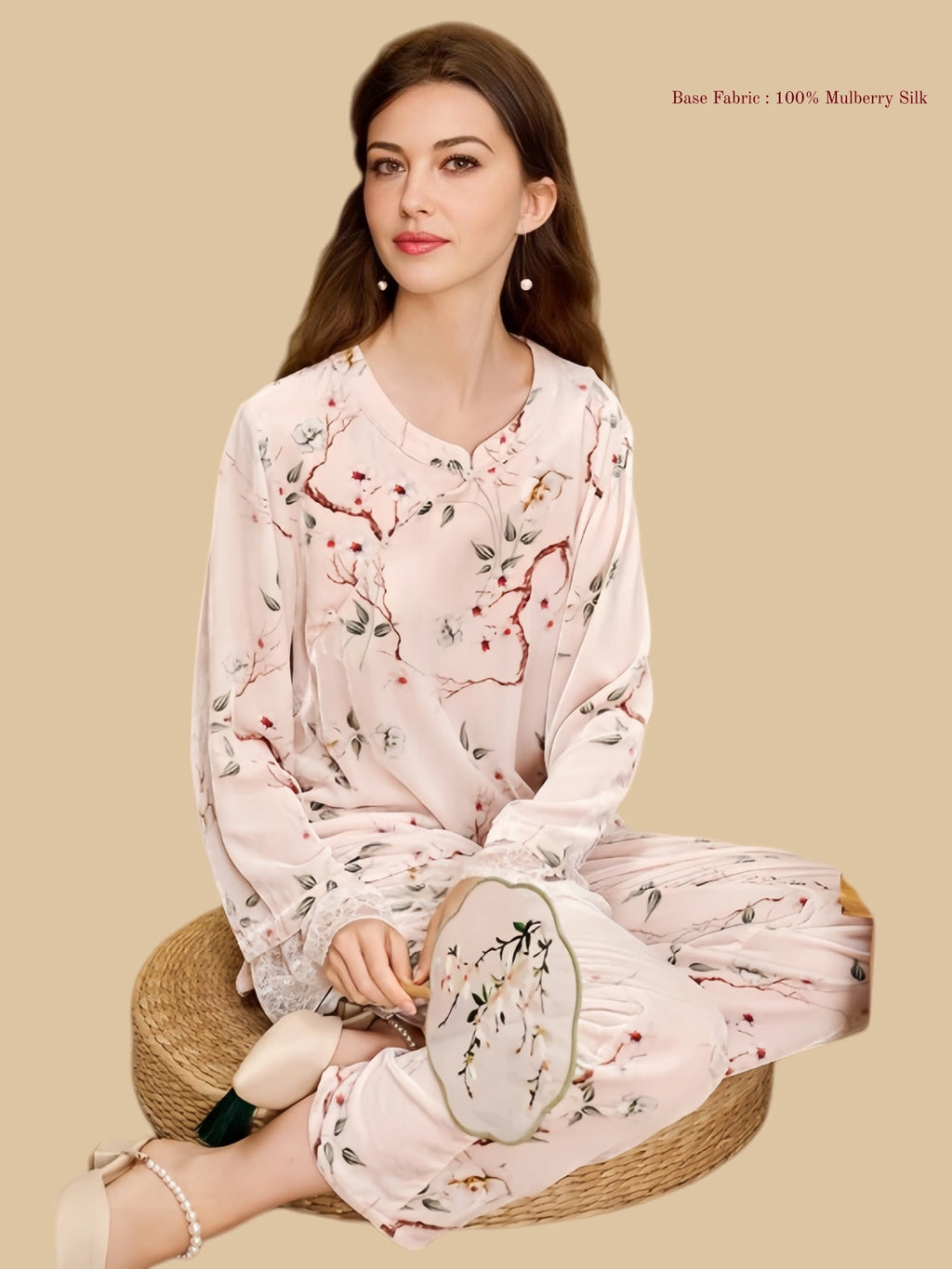 Pink heavyweight velvet home set seated view with blossom branch print and straight trousers