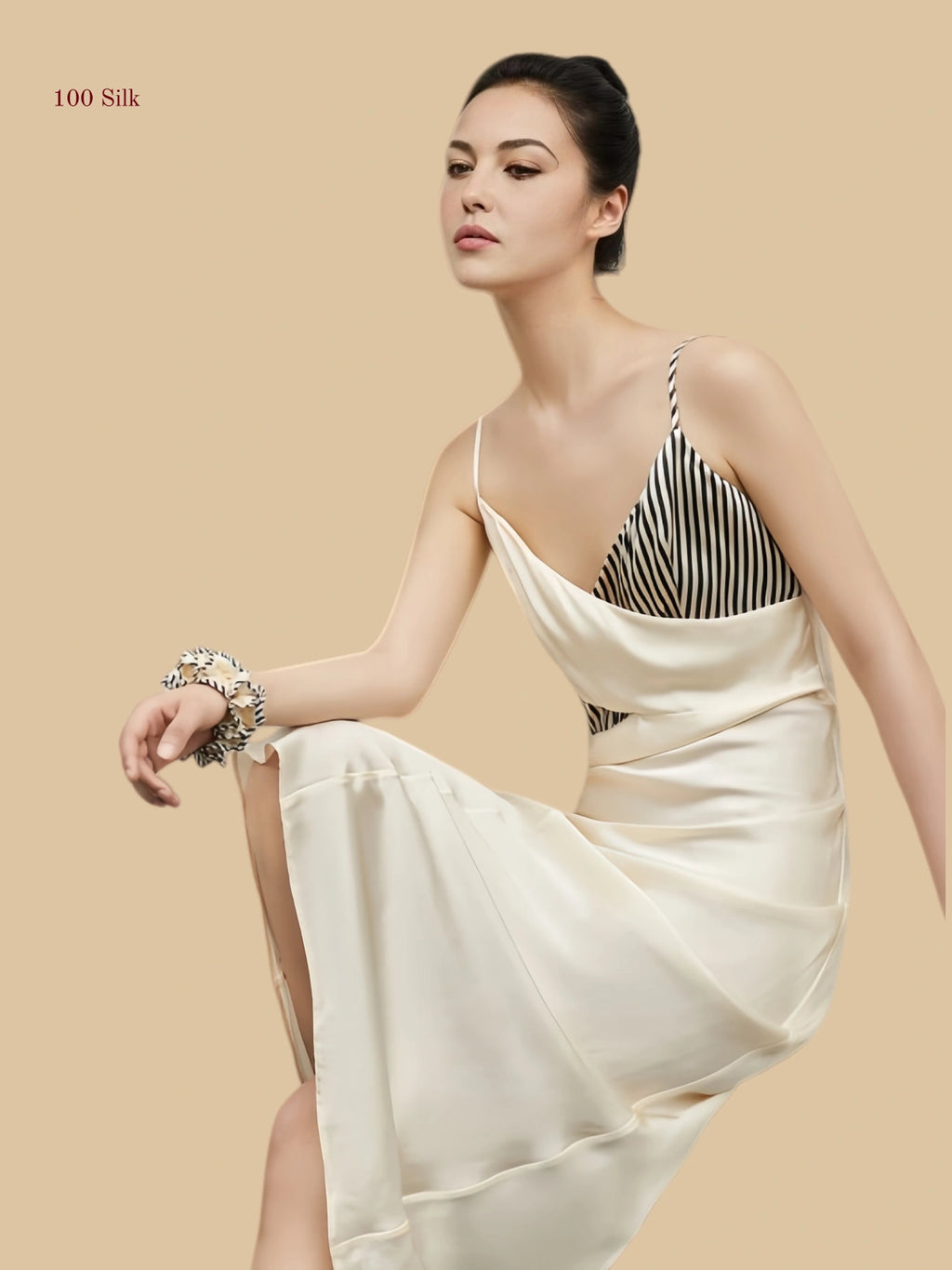 19mm white mulberry silk dress featuring a unique criss-cross wrap bodice with contrasting striped and solid panels.