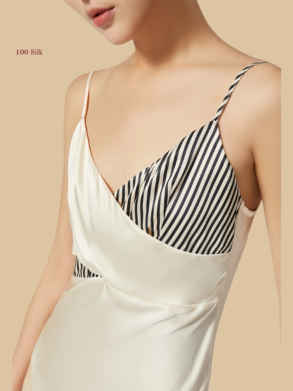 19mm white mulberry silk dress featuring a unique criss-cross wrap bodice with contrasting striped and solid panels.