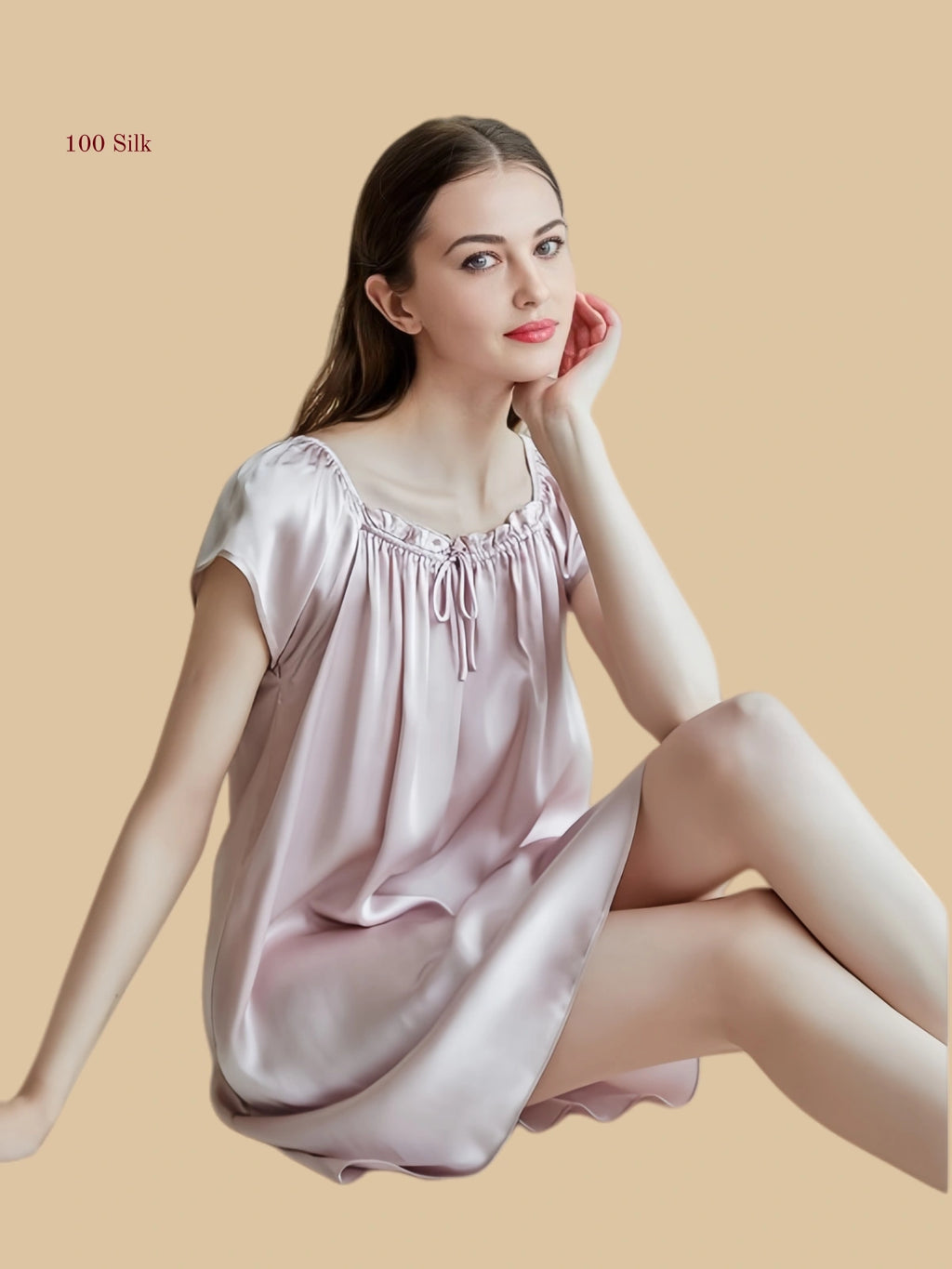 Pink 19mm silk sleep dress seated view with gathered neckline and fluid drape