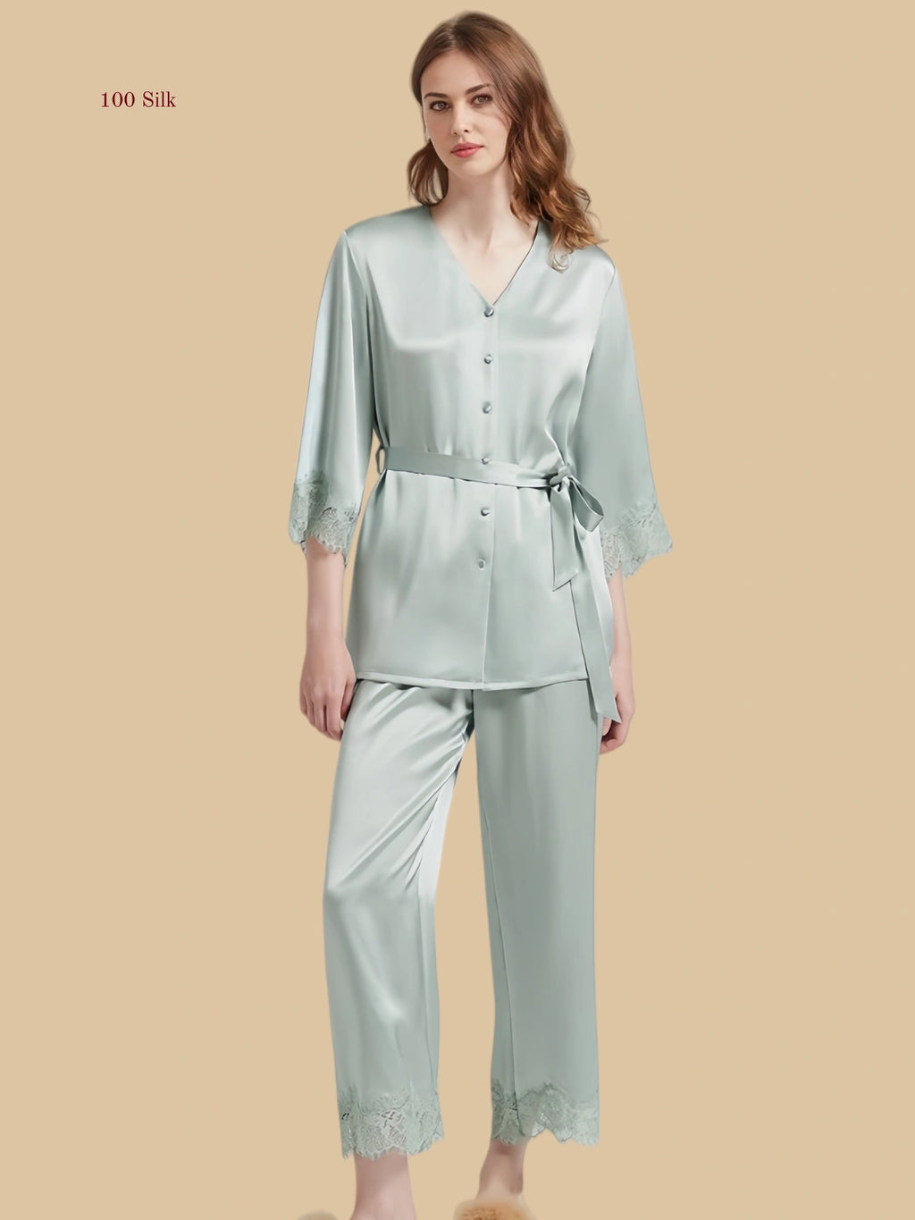 Mint green 19mm waist-tie silk set front view with V neckline, lace-trim cuffs, and full-length pants