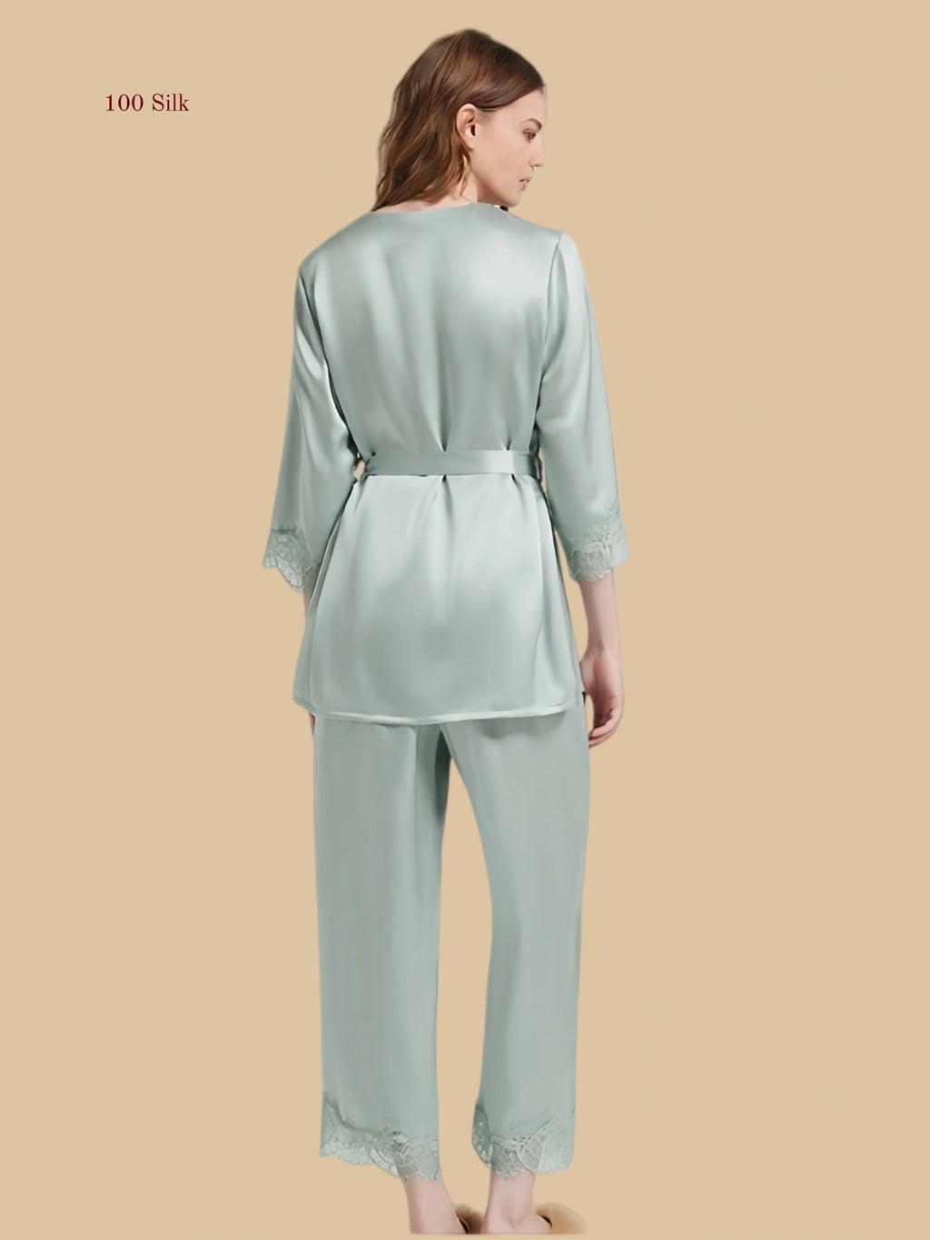 Mint green 19mm waist-tie silk set back view with tied waist and lace-trim pant hems